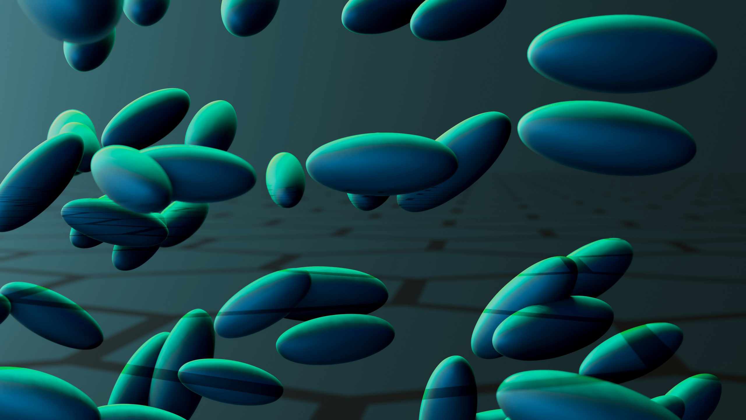 3D-Visualisierung von schwebenden, ovalen Formen in blau-grünen Farbtönen, die eine abstrakte Darstellung von Molekülen oder Partikeln im Raum darstellen.